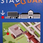 Stadtbar mit Plan – Bild